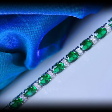 Simulated emerald and diamonds fashion bracelet